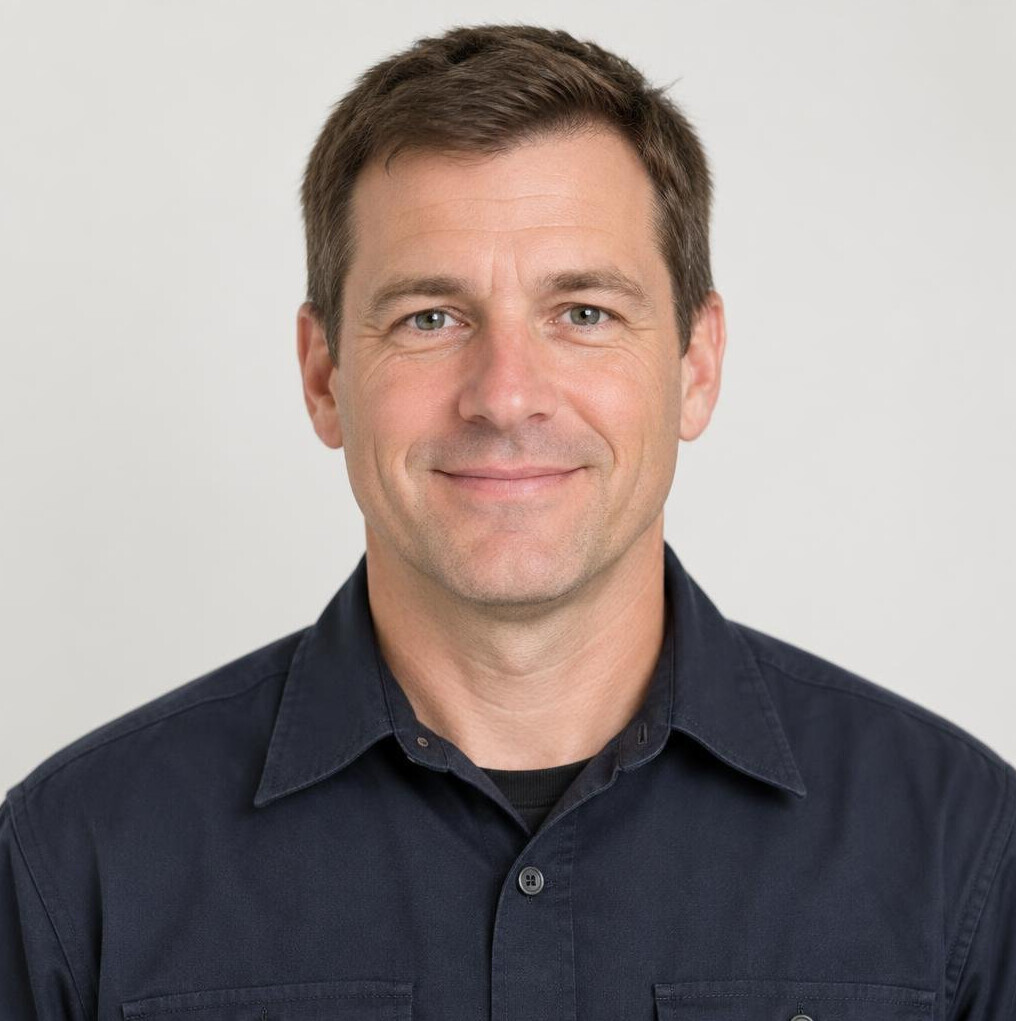 Portrait of a smiling man in a work shirt