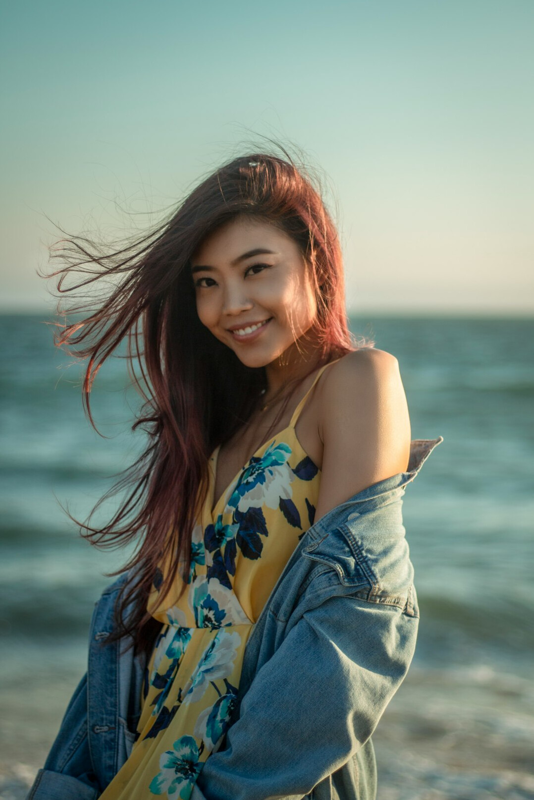 Portrait of a smiling woman with long hair